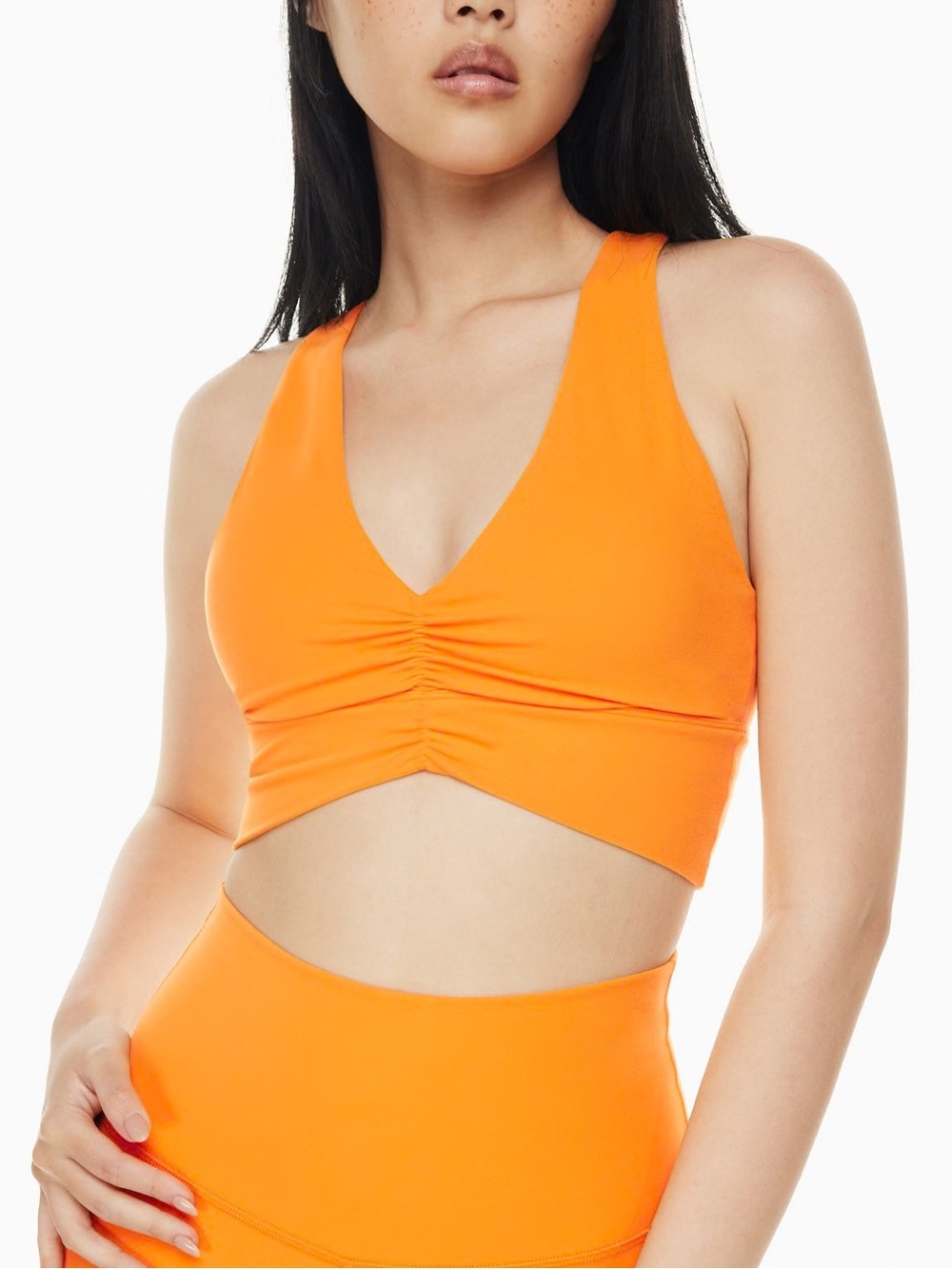 Aritzia TNA size small TnaBUTTER Volley Sports Bra Orange V-Neck Ruched Women